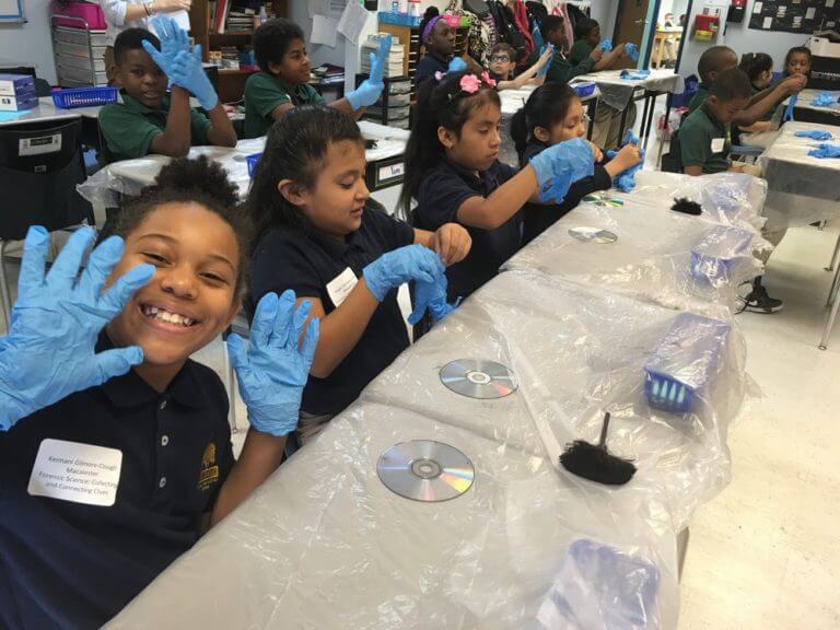 Students in the Forensic Science Expedition try fingerprinting!