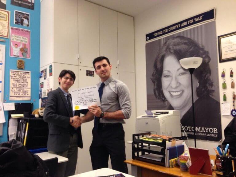 Gabriel, right, dances with one of the EMIA instructors.