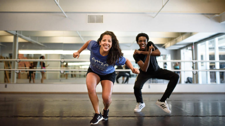 Gabriel, right, dances with one of the EMIA instructors.