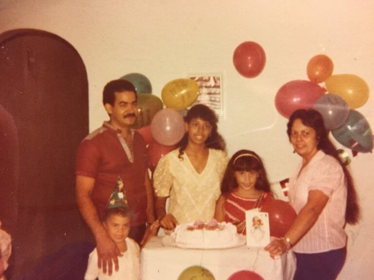 Anthony Rosario (left) and his family when he was a child.
