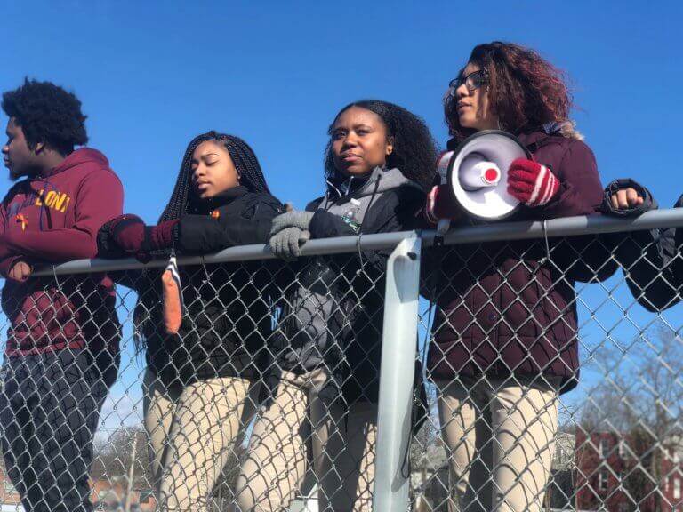 Mahogany and her classmates stand at the walkout