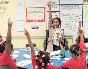 Teacher Ashlee Bowman and her students in the classroom.