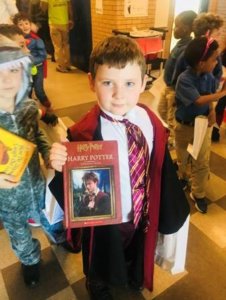 A student dresses as Harry Potter