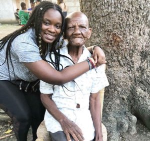 Rose Lee hugging an elderly man