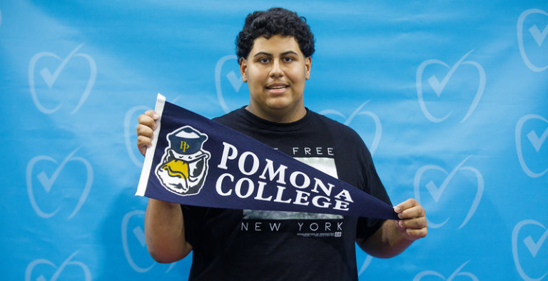 Santiago holding Pomona pennant