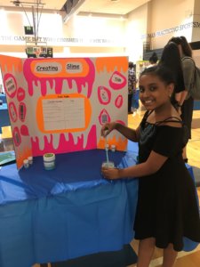 Ava at the science fair