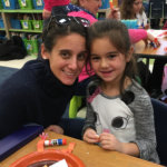 Amelia and a student in the classroom