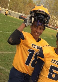 Elijah in his football uniform