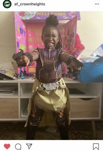 Scholar in Black Panther Costume