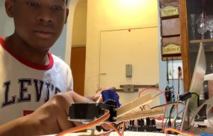 Juelz working on a robotic arm